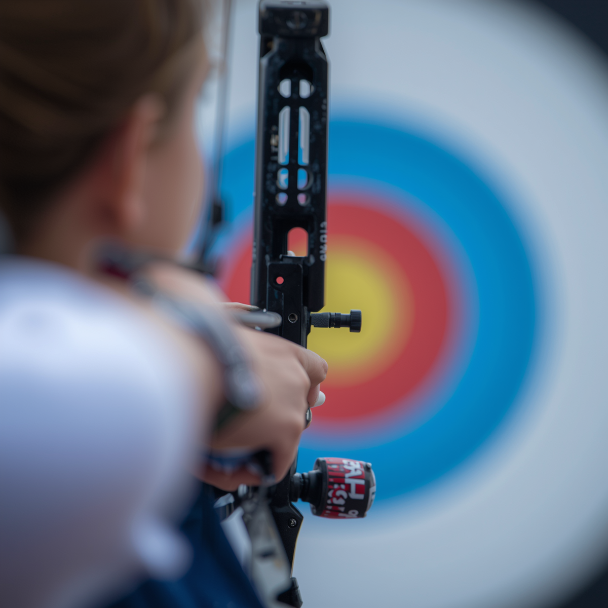 Archer aiming at a blurry target